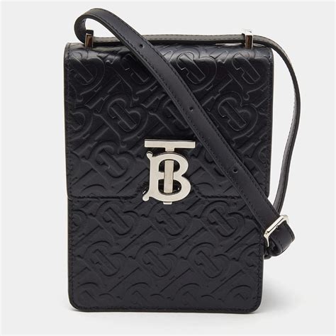 Monogram Leather Robin Bag in Black .